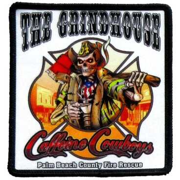 Patch featuring a skeleton firefighter with an axe and text reading 'The Grindhouse Caffeine Cowboys'.