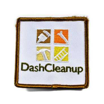 Square patch with tool icons and the text "DashCleanup" below.