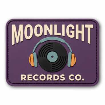 A purple patch with text 'MOONLIGHT RECORDS CO.' and headphones over a vinyl record.
